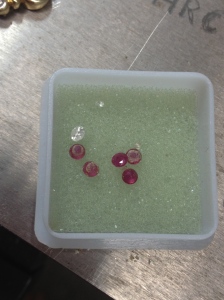 5 rubies from an old ring of mine, plus a decent sized diamond from another old ring I'll never wear. Those can be used later in something else.